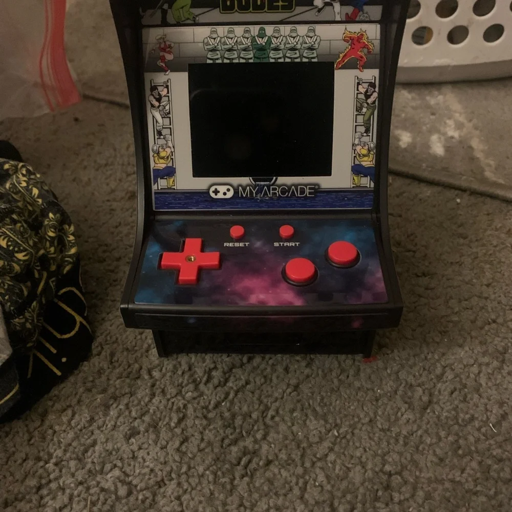 Arcade compact handheld